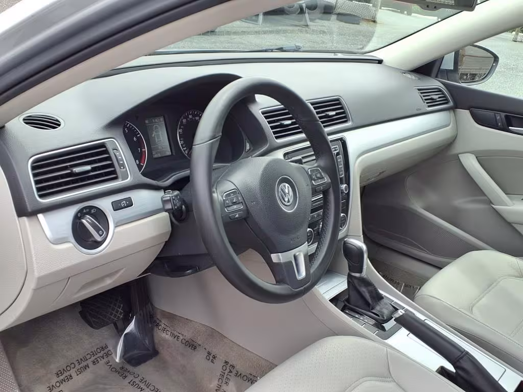 2012 Volkswagen Passat - 1VWBP7A35CC074102 - Image #11