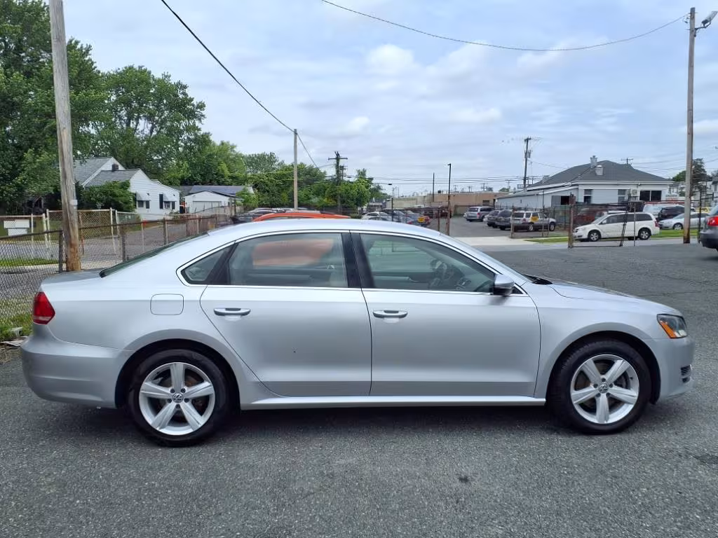 2012 Volkswagen Passat - 1VWBP7A35CC074102 - Image #6
